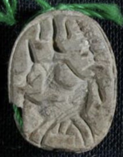 Astarte - Steatite scarab depicting Astarte with horned crown, riding a horse