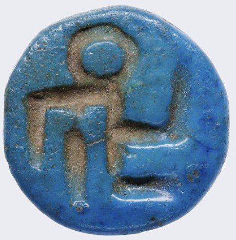 blue glaze squatting child button amulet front