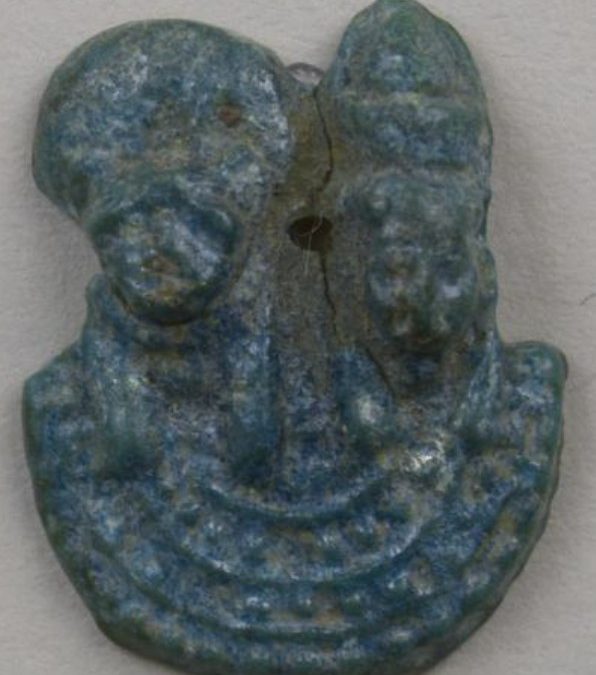 Blue glazed aegis of a cat/lioness-headed goddess (Bastet?) and of Mut flat back