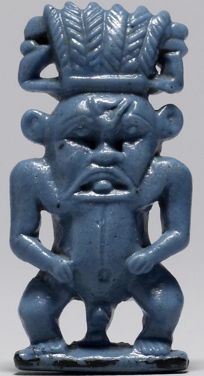 Blue glazed crowned Bes with plumes and uraei with sun discs Blue glazed crowned Bes with plumes and uraei with sun discs