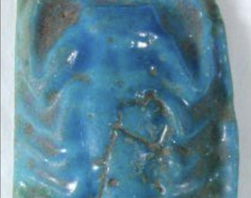 Blue glazed scorpion plaque