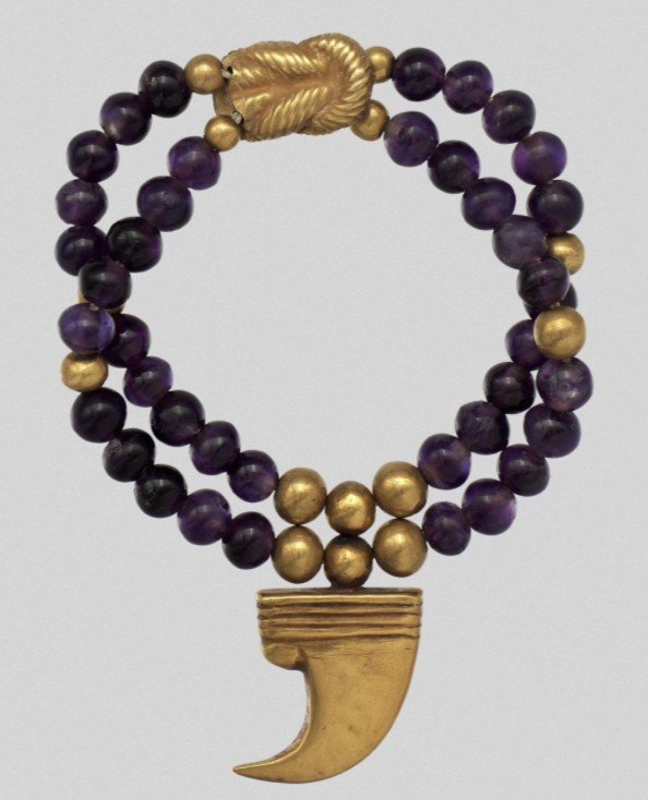 Gold and amethyst anklet with claw pendant Gold and amethyst anklet with claw pendant