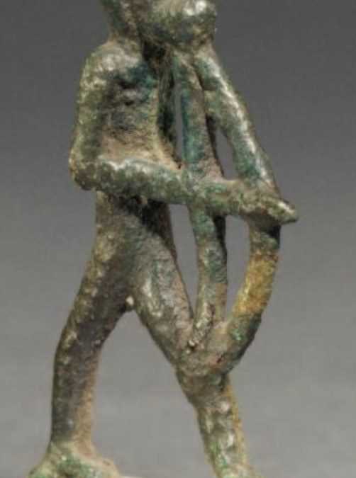 Copper alloy Atum as a striding monkey archer