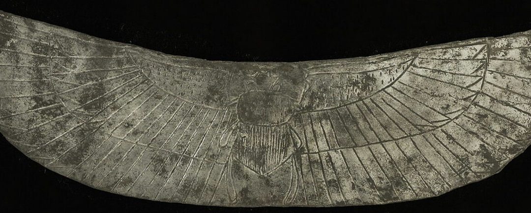 Engraved silver winged scarab