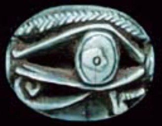 Glazed openwork steatite Wedjat eye Glazed openwork steatite Wedjat eye