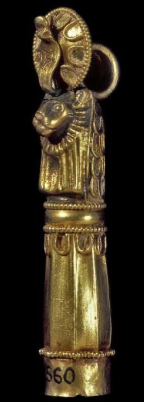 Gold in two parts with a lioness head with sun disc and uraeus cylindrical case Gold in two parts with a lioness head with sun disc and uraeus cylindrical case