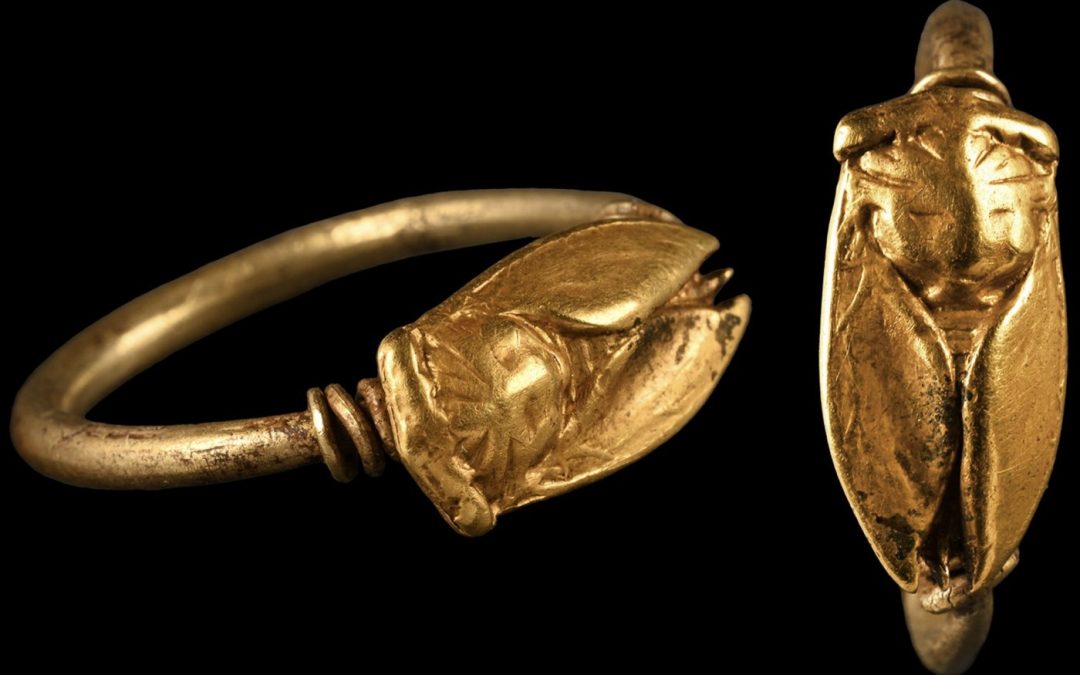 Gold ring with a possible human-headed beetle