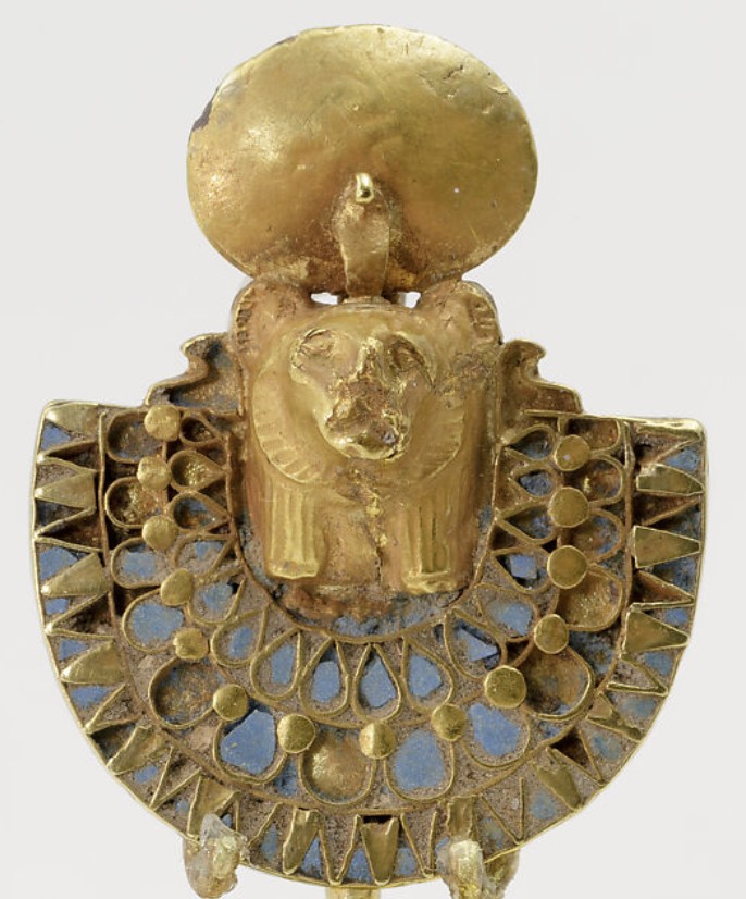 Gold with encrustations of an aegis of Bastet or Sekhmet Gold with encrustations of an aegis of Bastet or Sekhmet