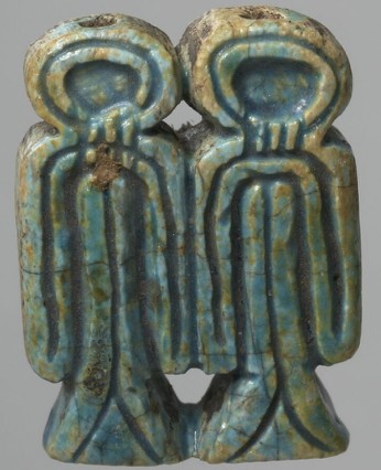 Green enamelled steatite pierced twice vertically and inscribed backwards double Isis knot
