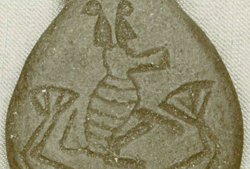 green glaze baboon in boat amulet
