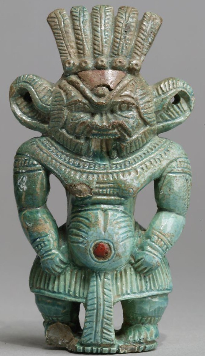 Green glaze Bes with red navel inlay Green glaze Bes with red navel inlay