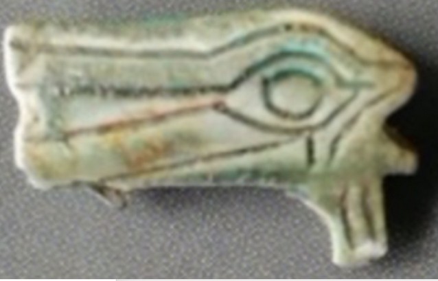 Green glazed steatite, pierced for suspension Wedjat eye Green glazed steatite, pierced for suspension Wedjat eye