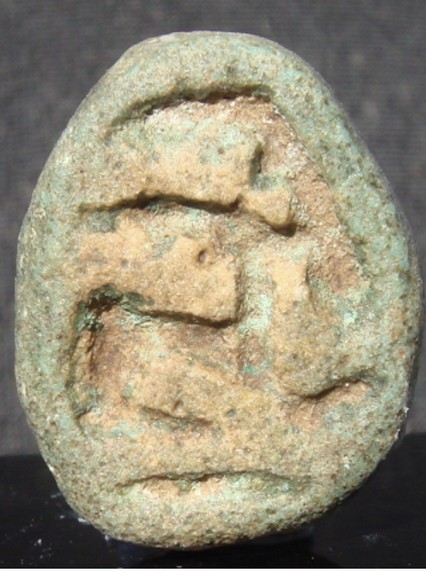 Khepri Green glazed steatite scaraboid with a human head, base