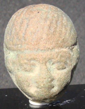 Khepri Green glazed steatite scaraboid with a human head from Naukratis