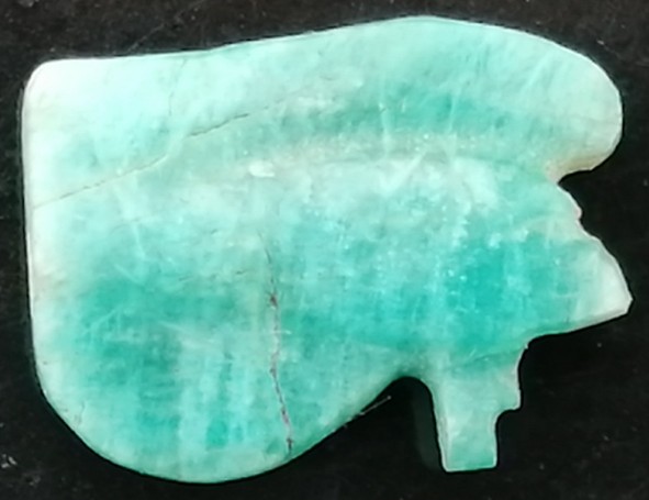 Incised amazonite, flat back, pierced for suspension Wedjat eye