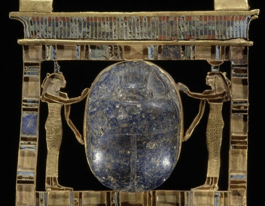 Gold pectoral of Isis and Nephthys protecting a scarab