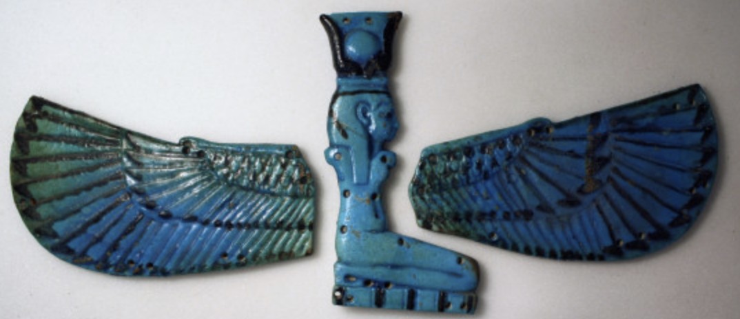 Kneeling winged Isis-Hathor - Blue and black glazed kneeling on a mat reed with 40 piercings and two