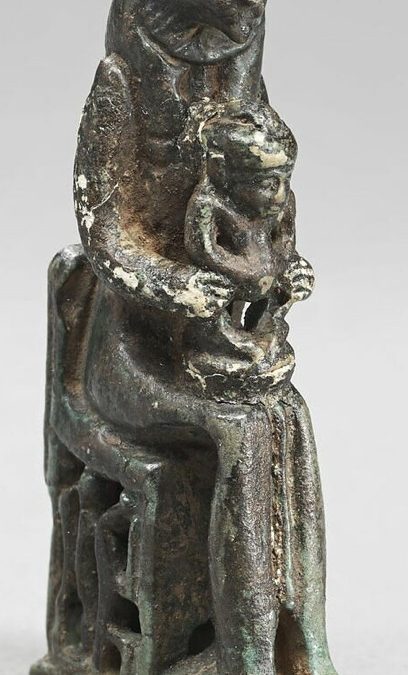Lioness-headed goddess holding a child - Faded green glaze, headdress missing H 6.4, W 1.8, D 3.5