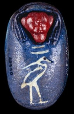 Multicoloured glazed human-headed heart scarab