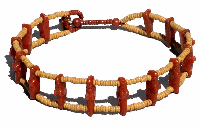 Grasshopper or locust Red jasper locust spacer beads of a reconstructed bracelet