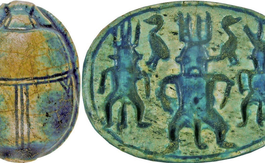Blue/green glazed steatite scarab with three Bes and two geese