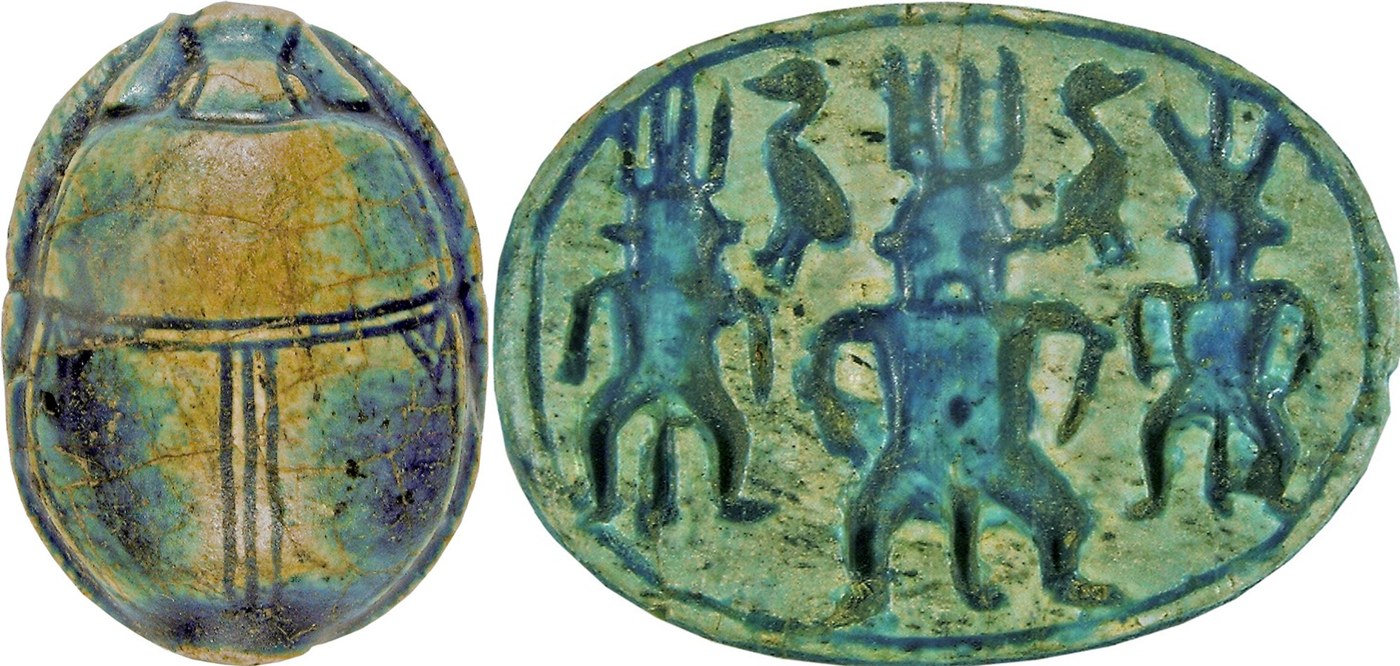Blue/green glazed steatite scarab with three Bes and two geese Blue/green glazed steatite scarab with three Bes and two geese
