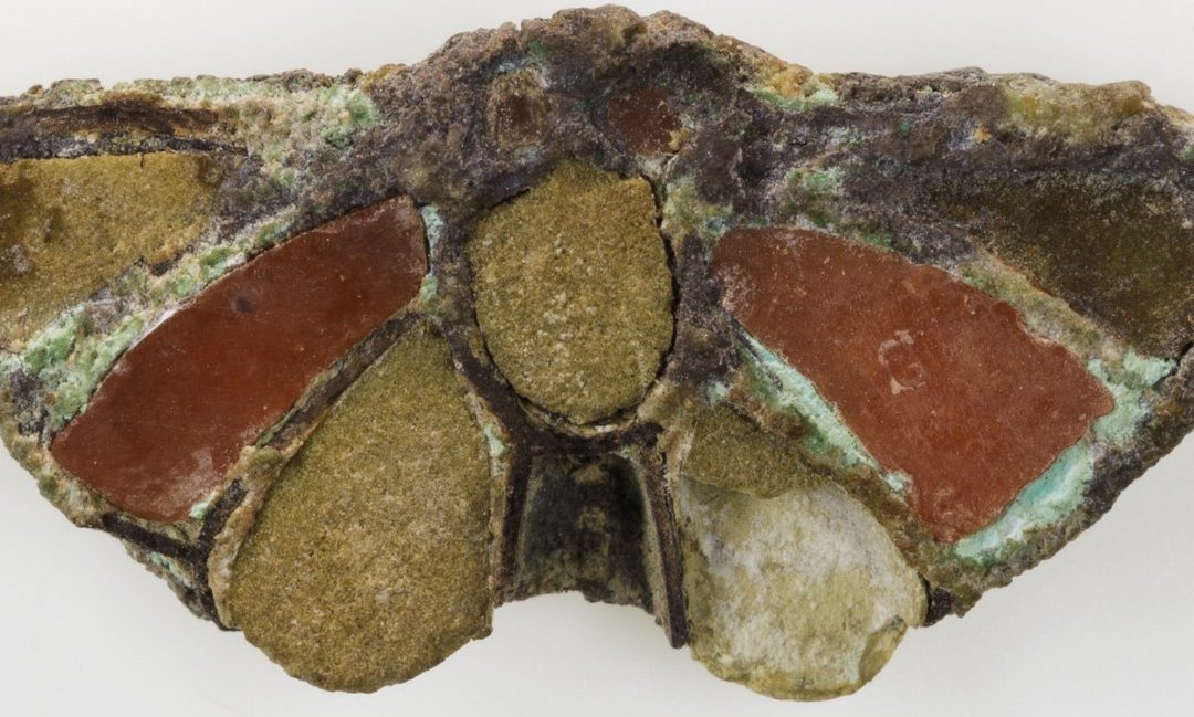 Silver butterfly amulet with carnelian and faience encrustations