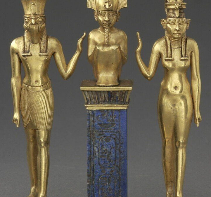 Gold and lapis lazuli triad of Horus, Osiris and Isis, front